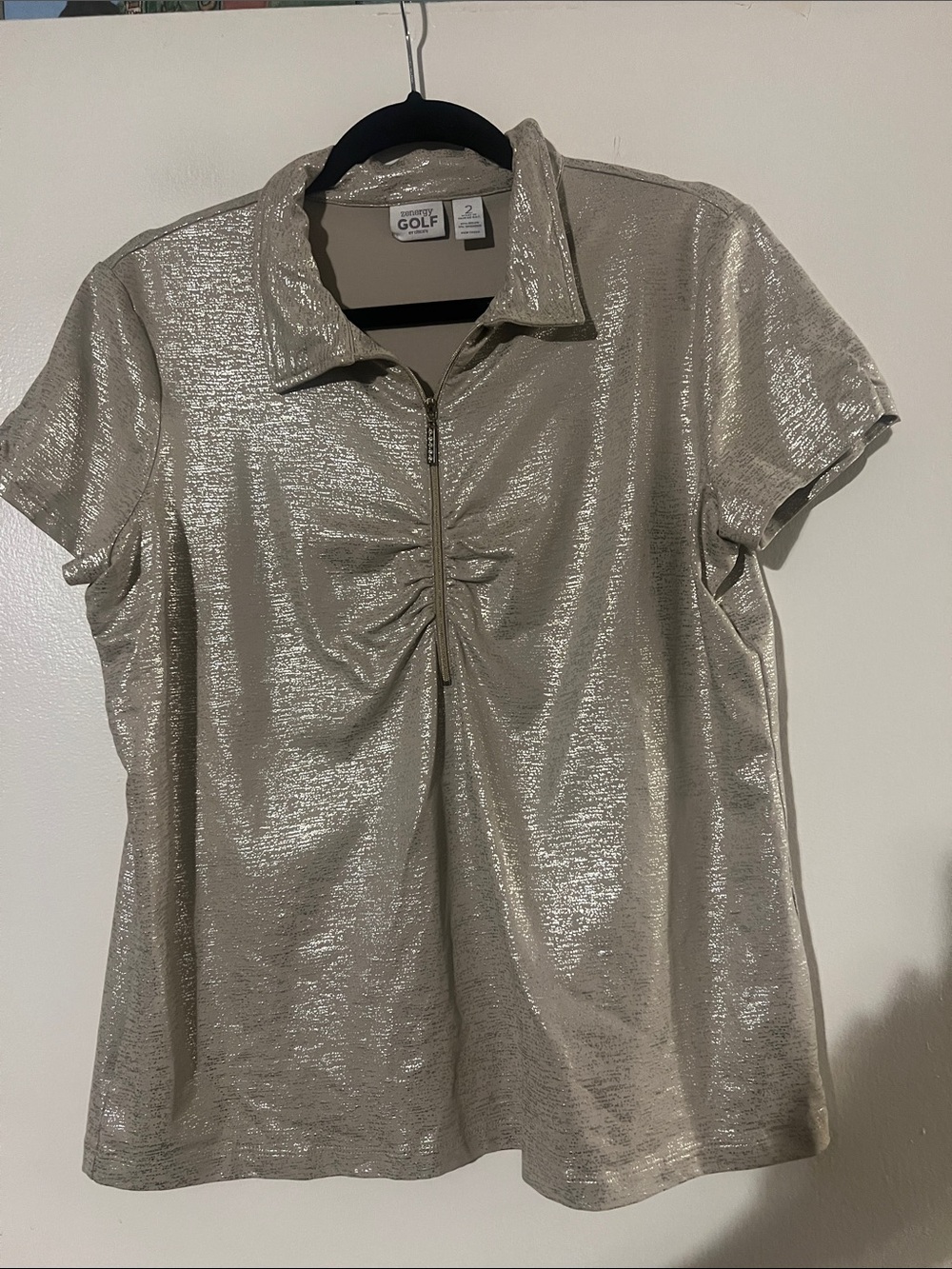 Zenergy golf by Chicos polo collar shirt. Zip front. Cap sleeve. Metallic sheen